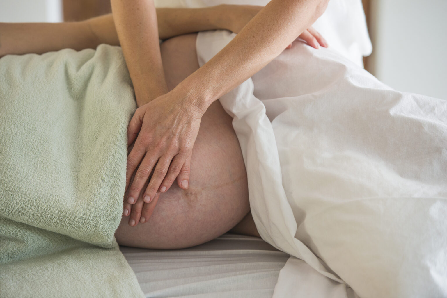 Woman having prenatal massage